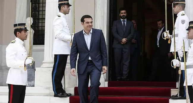 Le Premier ministre Grec Alexis Tsipras accueillant le 17 juin 2015 le chancelier autrichien Werner Faymann à Athènes - Yorgos Karahalis/AP/SIPA


