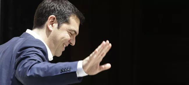Alexis Tsipras , le premier ministre grec, s'est engagé à promulguer dès le 1er juillet une loi de finances rectificative et à poursuivre le redressement budgétaire du pays en accéléré. Crédits photo : Thanassis Stavrakis/AP


