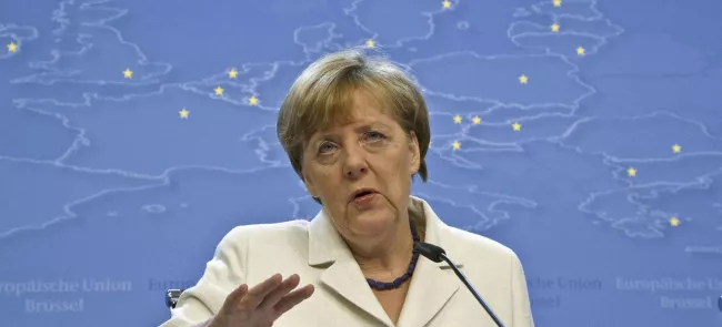 Angela Merkel pendant une conférence de presse, lundi à Bruxelles. Crédits photo : Michel Euler/AP


