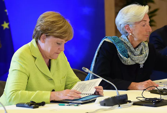 Angela Merkel et Christine Lagarde, présidente du FMI, lors d'un sommet en juin. Image: ARCHIVES/AFP


