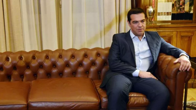 Délaissé par l'aile de gauche de Syriza, Alexis Tsipras pourrait payer dans les urnes l'accord européen qu'il a accepté. Crédits photo : LOUISA GOULIAMAKI/AFP


