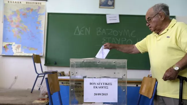 Un peu moins de dix millions de Grecs sont en âge de voter. Crédits photo : Thanassis Stavrakis/AP


