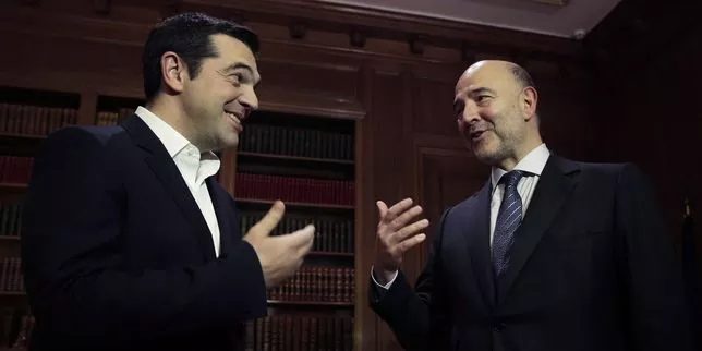 Alexis Tsipras et Pierre Moscovici, le commissaire européen chargé des affaires économiques et financières, à Athènes le 3 novembre.


