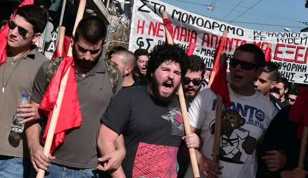Lors de la manifestation à Athènes, ce jeudi.


