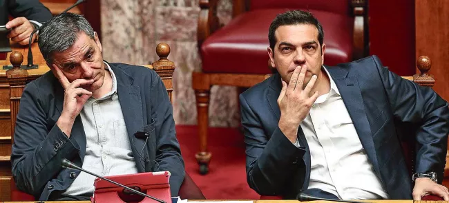Euclide Tsakalotos, ministre des Finances d'Alexis Tsipras, session parlementaire à Athènes, le 22 mai. Crédits photo : Yorgos Karahalis/AP


