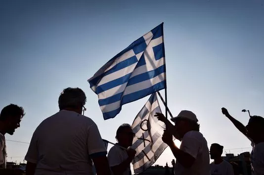 Manifestation en face du parlement grec à Athènes, le 5 juin 2016, pour célébrer le première anniversaire du référendum au cours duquel 62% de la population a voté « non » (« oxi ») à de nouvelles mesures d'austérité.


