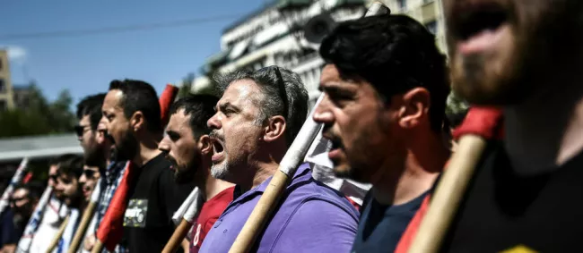 La grève de 24 heures a perturbé, en plein essor touristique, les transports aériens et urbains.  © AFP/ ARIS MESSINIS


